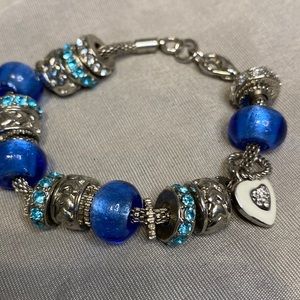 Charm bracelet silver color metal blue rhinestone and beaded charms white heart